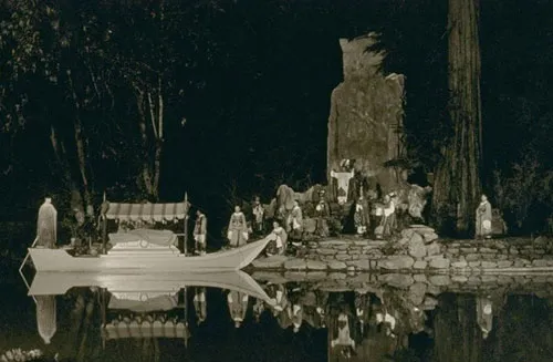 Detailed depiction of the bohemian grove owl sculpture located beside the retreat lake