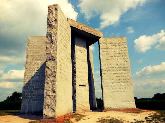 Close up of multilingual inscriptions on the Georgia Guidestones representing long term societal principles